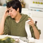 woman agonizing over financial